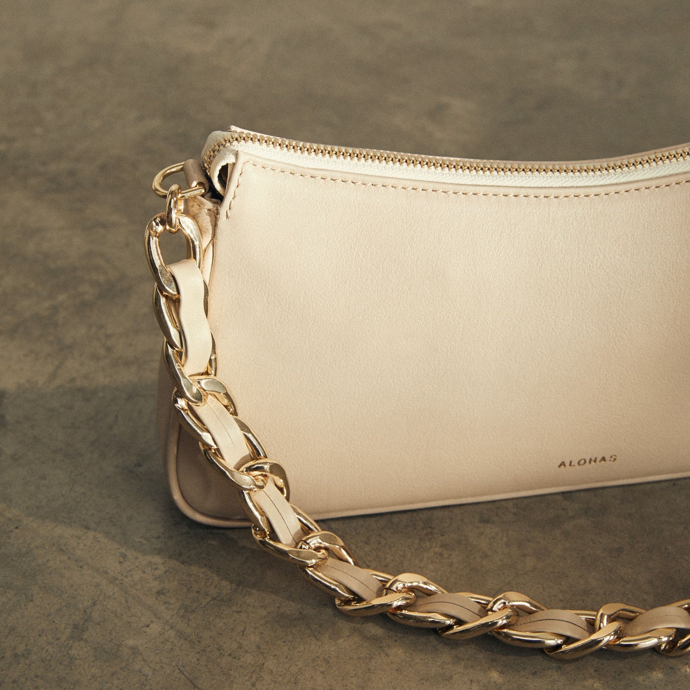 the-s-ivory-handbags-alohas-149514_8691e072-a119-4f1f-a51c-d69fc6346134.jpg