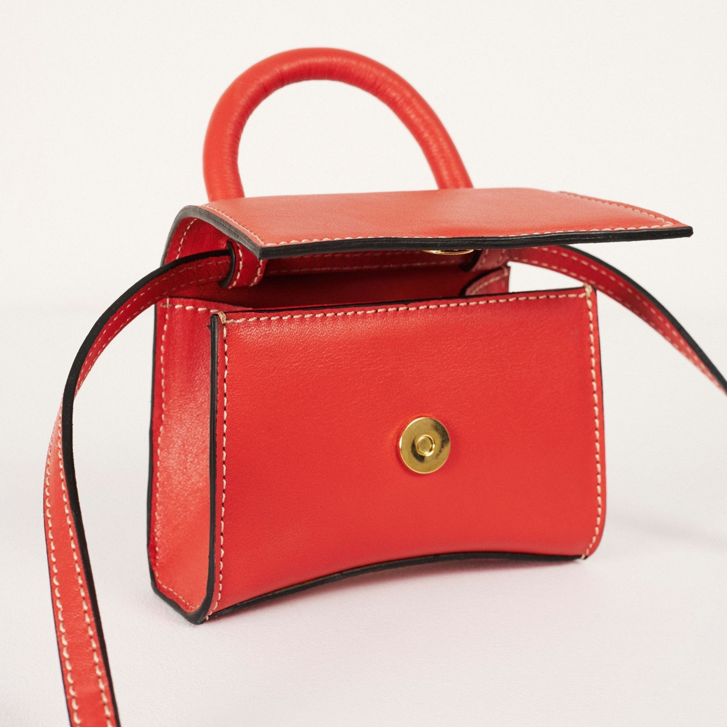 the-x-pomelo-orange-leather-mini-bag-handbags-alohas-198022.jpg